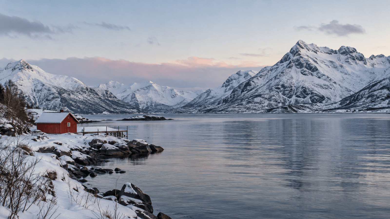 Illustration of a fjord landscape inspired by Kvaløya, with snow-covered mountains and a small red hut by the water.