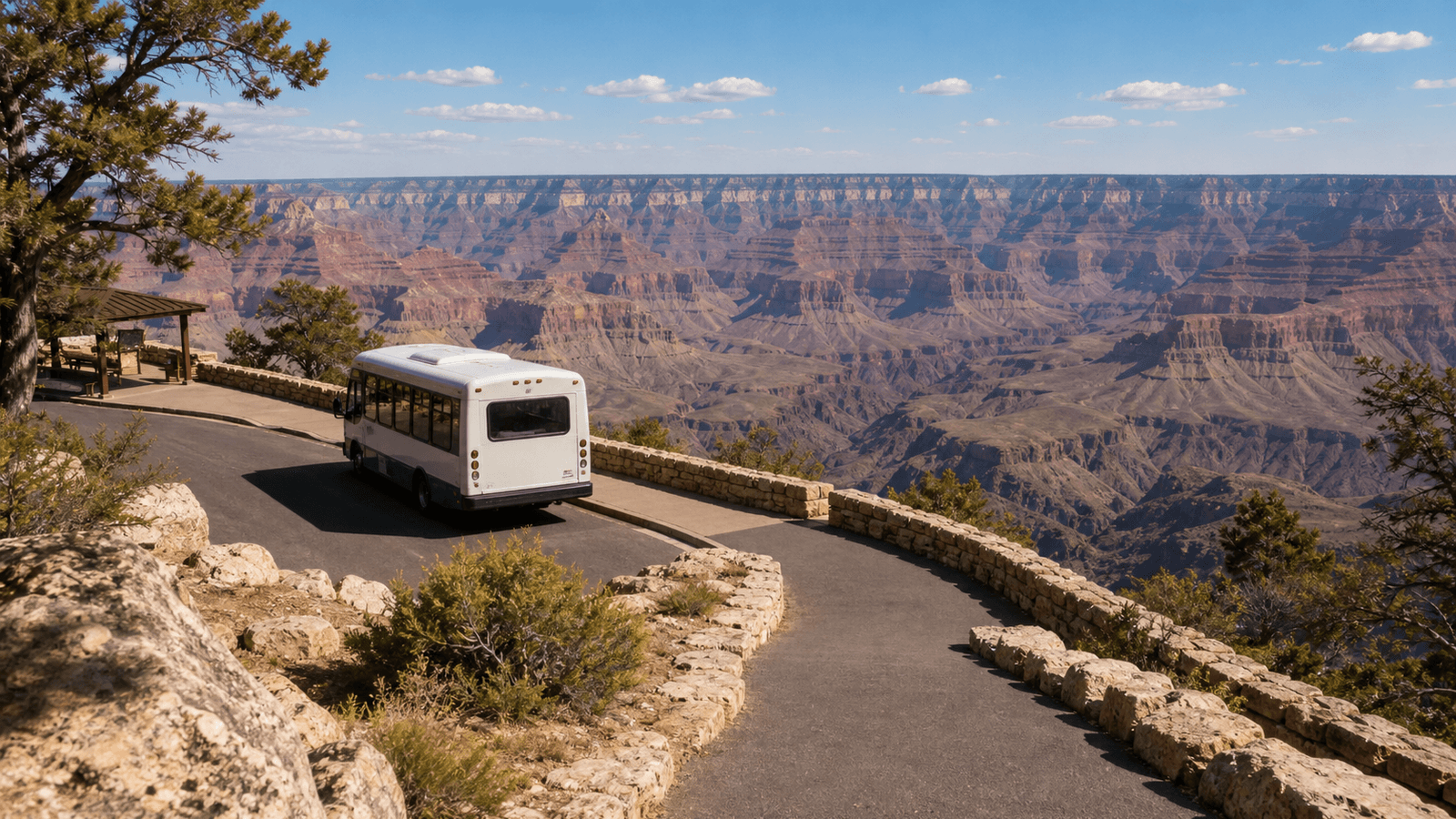 Bus on a road beside the canyon rim